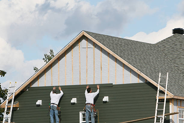 Professional Fiber Cement Siding technician working in East Liberty, OH